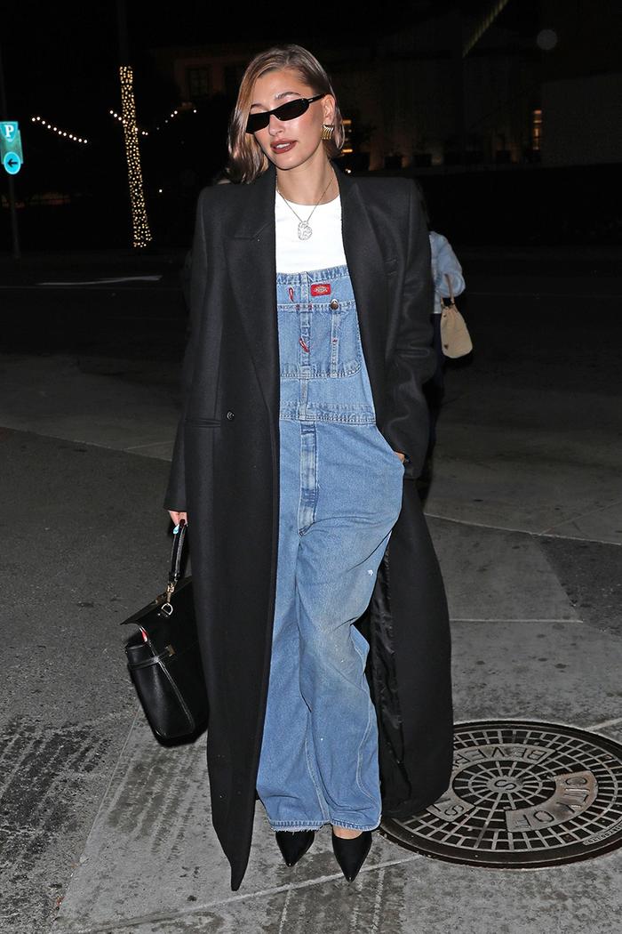 Hailey Bieber wearing overalls